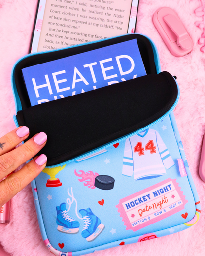 Hockey romance neoprene e-reader and book sleeve for Kindle, Kobo and books, with padded interior, zipper closure and charm ring.