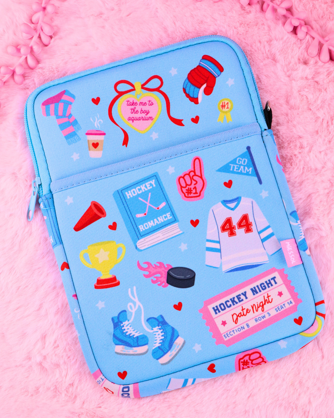 Hockey romance neoprene e-reader and book sleeve for Kindle, Kobo and books, with padded interior, zipper closure and charm ring.