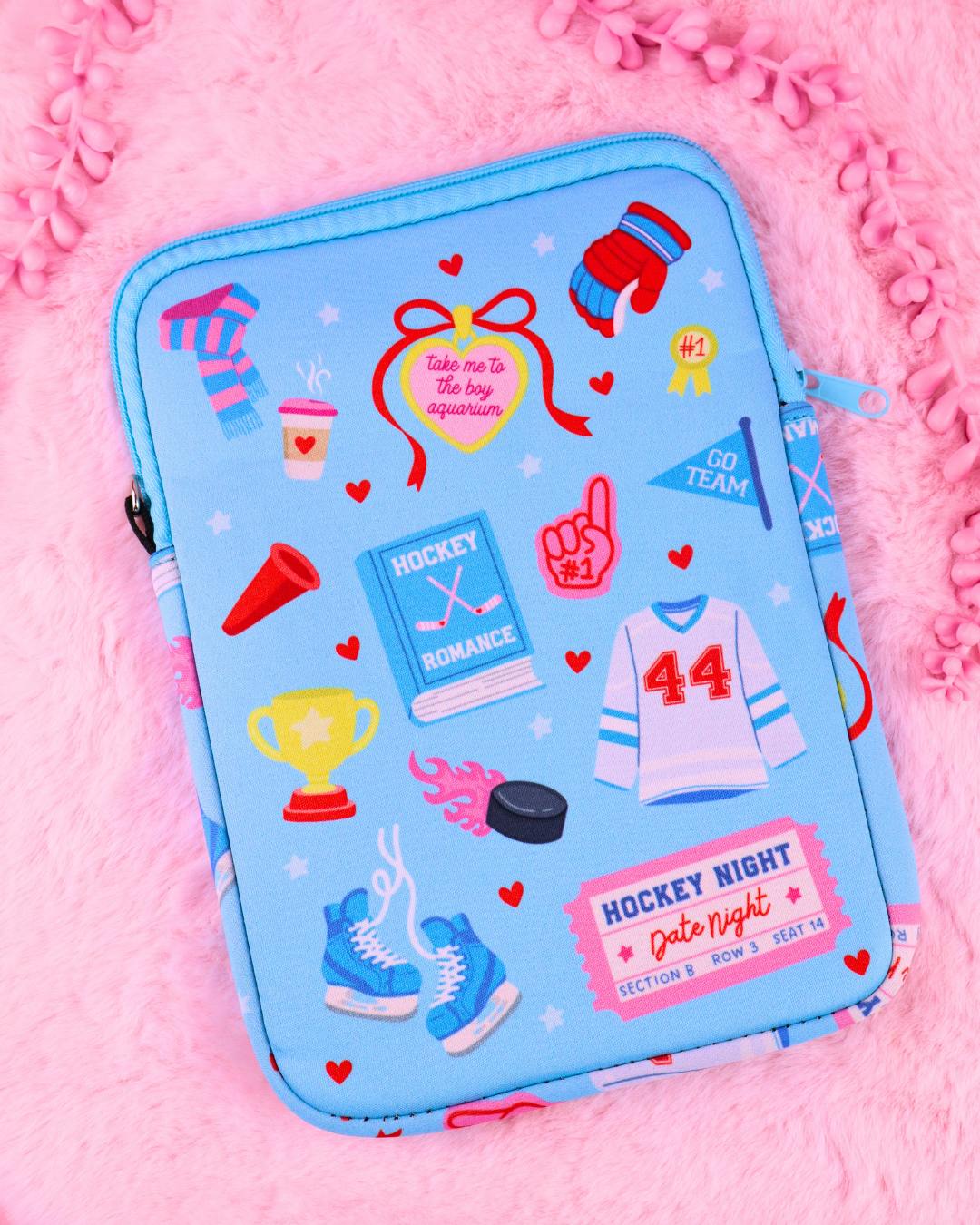 Hockey romance neoprene e-reader and book sleeve for Kindle, Kobo and books, with padded interior, zipper closure and charm ring.