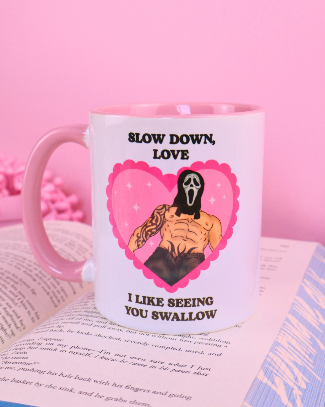 Masked men mug with the quote “Slow down, I like seeing you swallow”